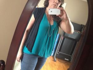 Closeup of the breezy teal turquoise tank and short sleeved jacket