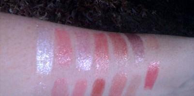 burts bees vs wet n wild lip shimmers swatches on my arm
